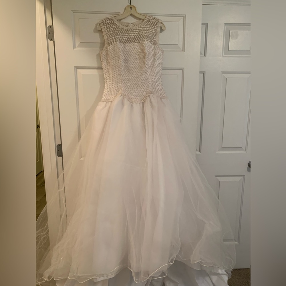 White wedding gown with train. Size 8